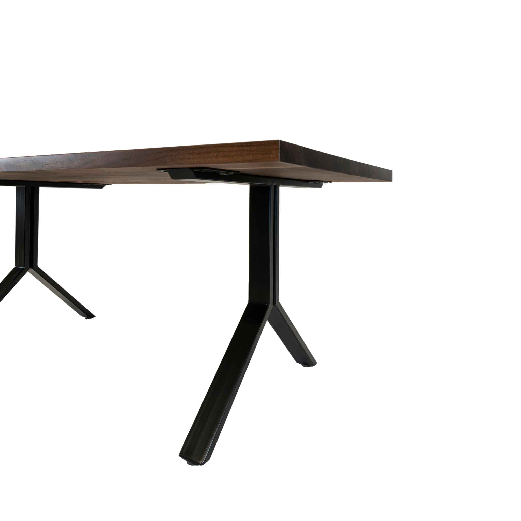 Modern walnut dining table. Created by Urban Industrial Design.