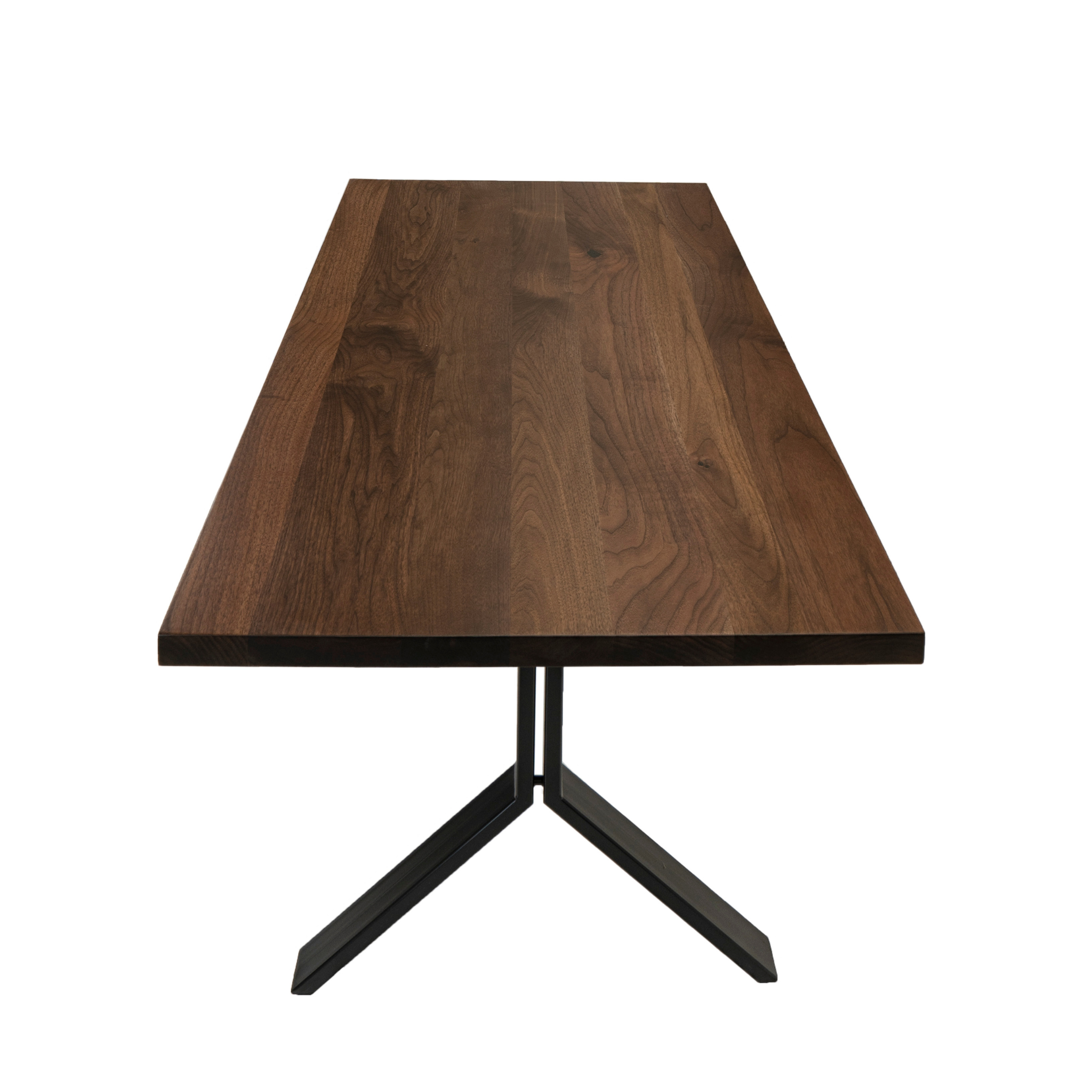 Modern walnut dining table. Created by Urban Industrial Design.