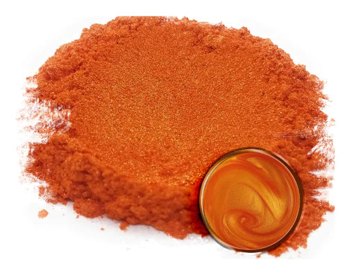 Powdered pigment by eye candy pigments for epoxy resin projects. In the color Kakiiro Orange.
